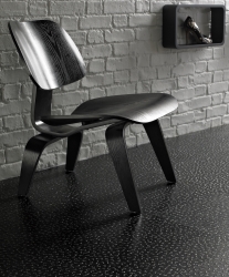 A modern, dark Karndean flooring design in mature room