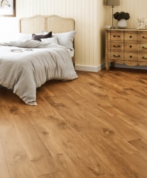 Comforting Karndean flooring in large bedroom